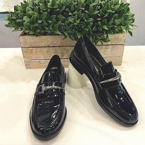 {nicole} Black Patent Leather Loafers with Silver Pendant Buckle Accent